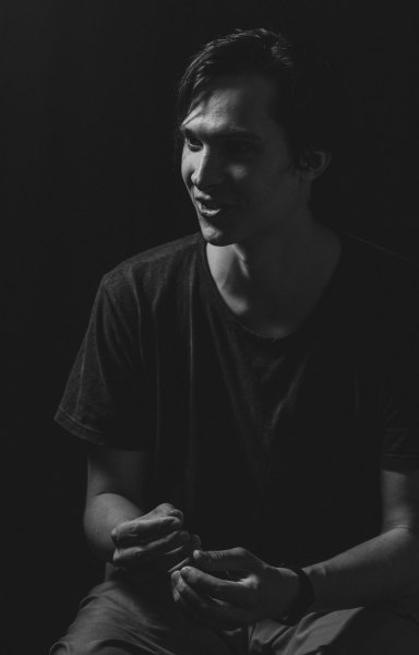 Low-key portrait of a young man
