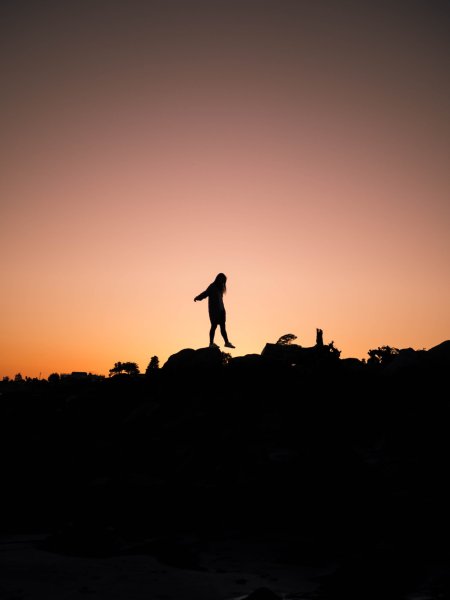 » Eye 4 Photography silhouetted person walking from rock to rock