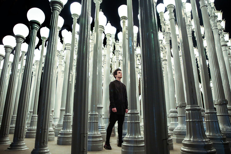 » Eye 4 Photography man standing among lights 24-70mm lens photography
